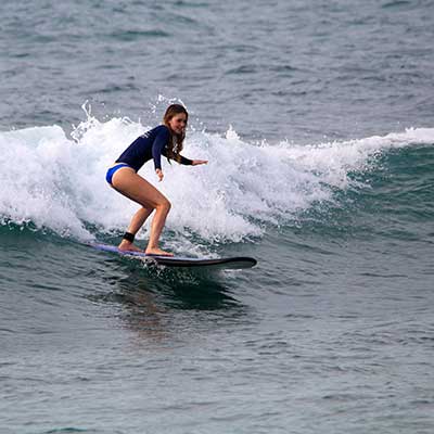 Beginner Surfer Girl at Balangan Surf Spot, Bali