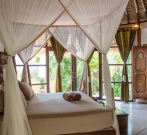 La Joya Deluxe Bungalow Bedroom View of Gardens