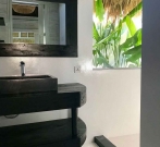 tropimoon lumbung bathroom at white palm bali surf house